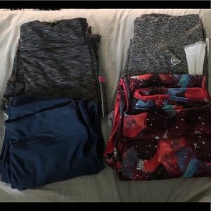 4 pairs of active leggings size large.